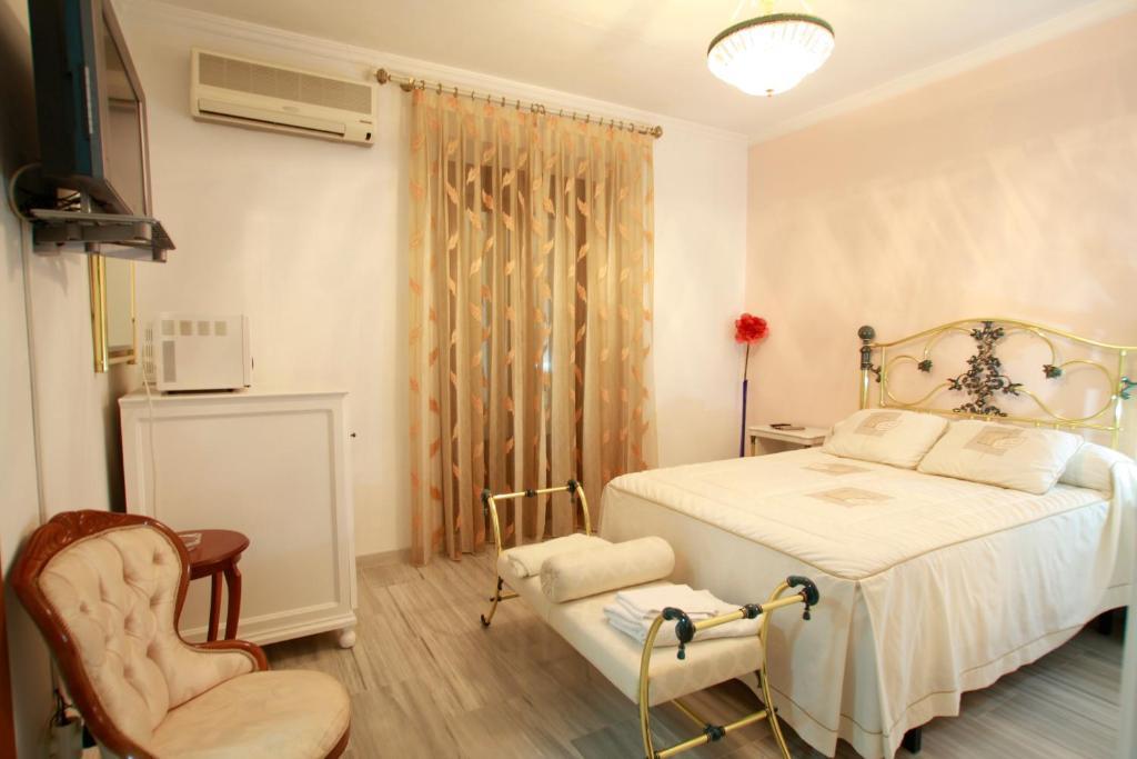 Hostal Jimenez Azuaga Номер фото